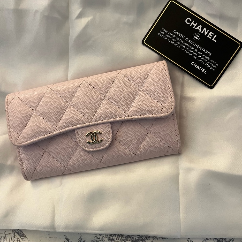 Chanel Classic Long Flap Wallet in light pink caviar leather.